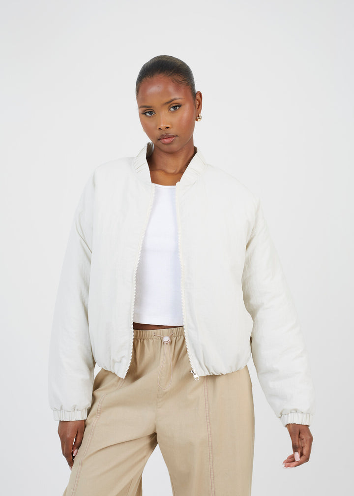 SHORT ELASTICATED JACKET, STONE