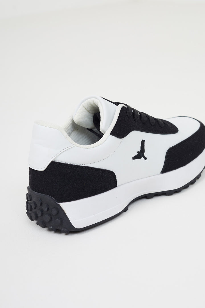 FAUX SUEDE BLACK & WHITE LACE UP TRAINER WITH EAGLE EMBROIDERY