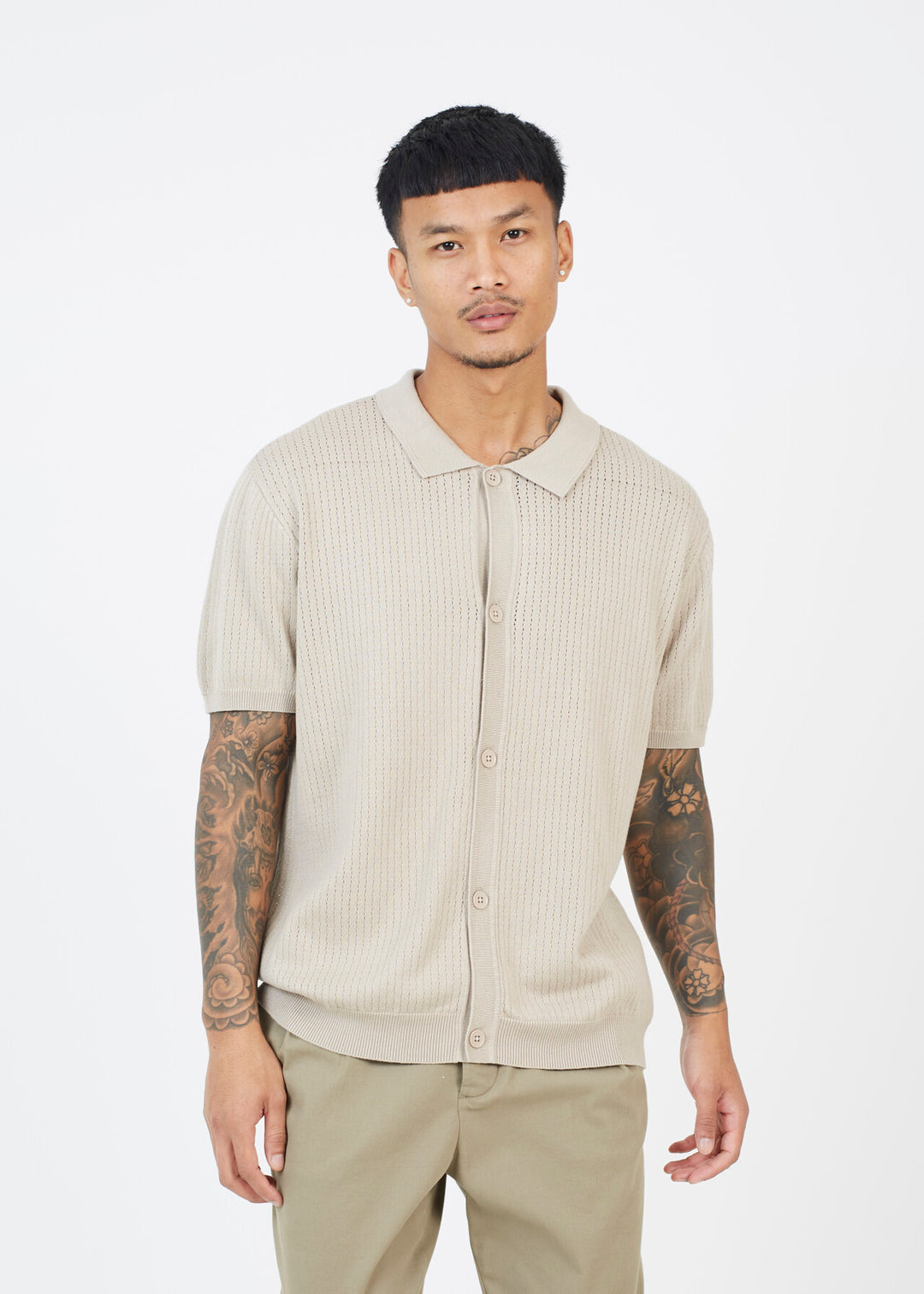 KNITTED BUTTON DOWN POLO NECK
