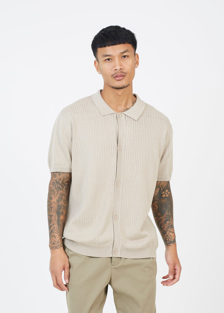 KNITTED BUTTON DOWN POLO NECK