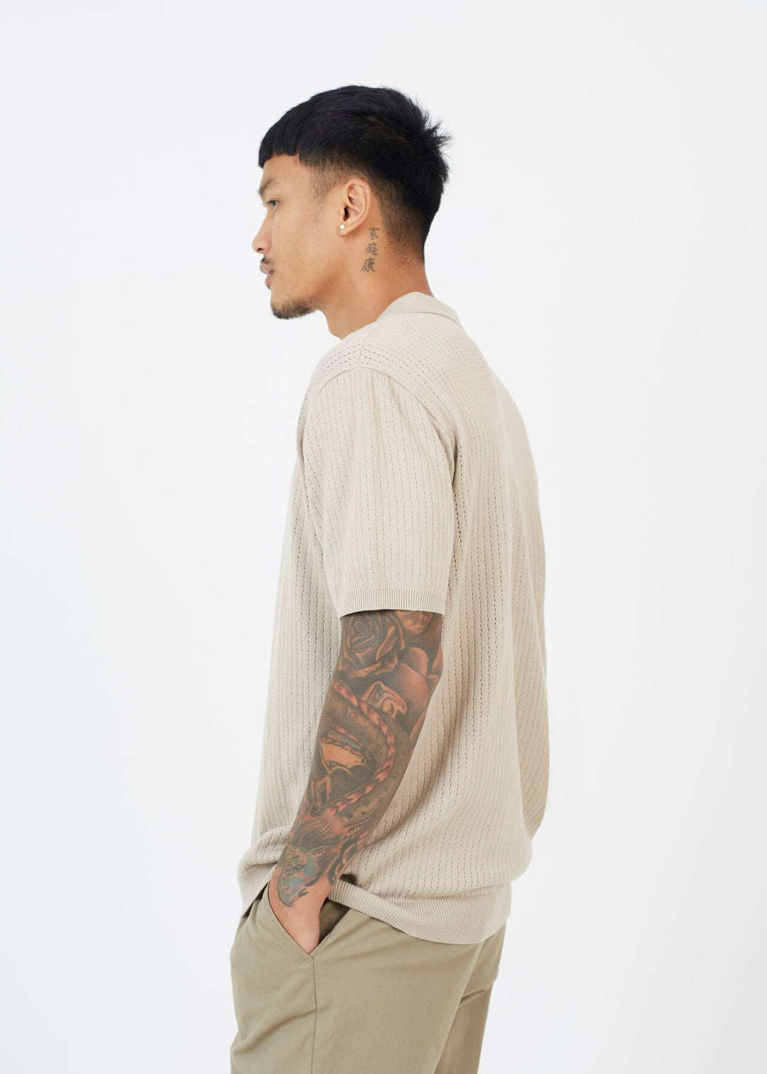 KNITTED BUTTON DOWN POLO NECK