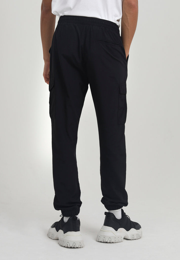 BLACK TASLAN CARGO POCKET ELASTICATED TROUSERS
