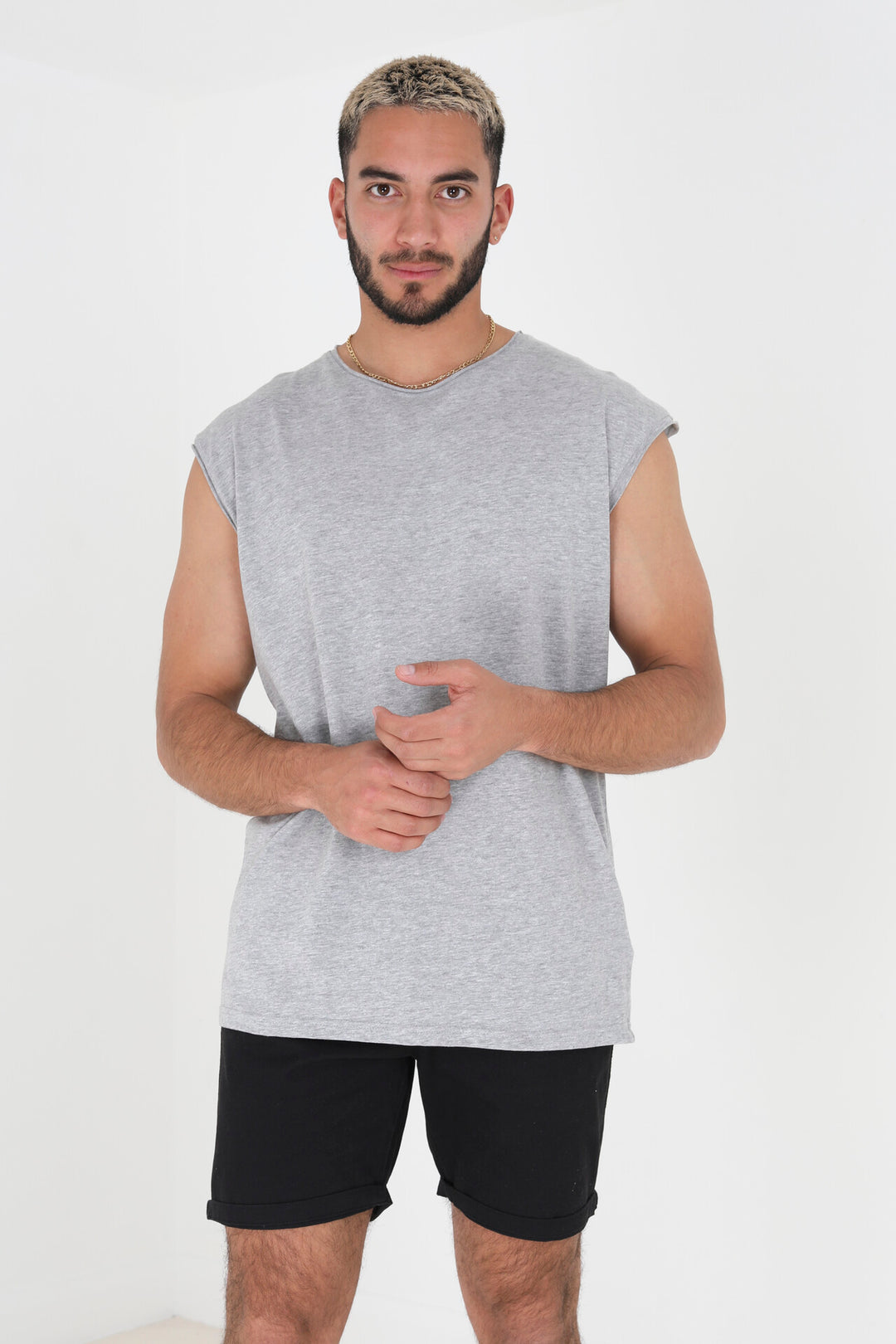 SLEEVELESS SOLID RAW ROLL EDGE VEST TOP